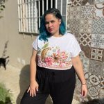 Photo of Ligia Viana, a website designer and marketing strategist who travelled with Hdden Variable to the Xingu Indigenous Park in Brazil. Foto de Ligia Viana, web designer e estrategista de marketing que viajou com a Hdden Variable para o Parque Indígena do Xingu, no Brasil.